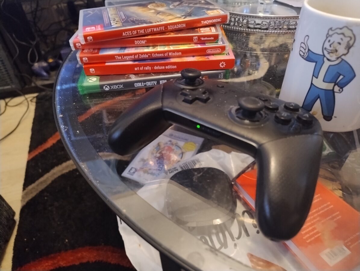 table with some video games